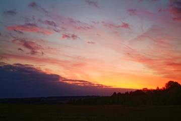 colorful sunset in the countryside in autumn, Russia.