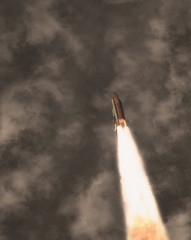 Flying rocket. The elements of this image furnished by NASA.