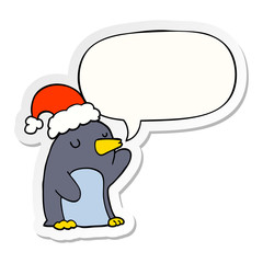 cute cartoon christmas penguin and speech bubble sticker