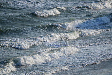 waves in the ocean on a sunny day