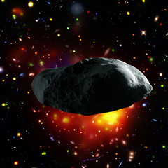 Asteroid flying in the deep space. Galaxies and stars. Elements of this image furnished by NASA.