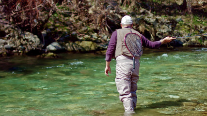 Fishing with flyfish in a creek
