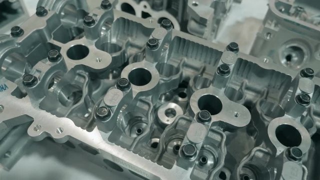 New cylinder heads of an internal combustion engine is presented for review at the exhibition. Shot in motion