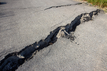 Landslide hit by flooding and road subsidence