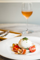 Artigiana Burrata Salad Herb marinated burrata, French cured pork shoulder and salad