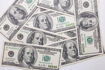 Texture of dollar bills. One hundred dollars.