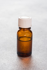 Glass transparent bottle for aromatic oils, Spa and perfumery. Copy space.
