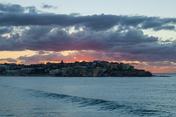 Obraz na płótnie Canvas Cloudy sunrise view of North Bondi Beach, Sydney, Australia.