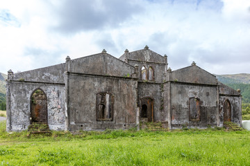 Fototapeta na wymiar Old ruins of abandoned house in the middle of Sao Miguel island, Azores
