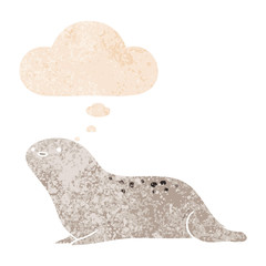 cartoon seal and thought bubble in retro textured style