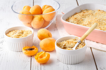 crumble with apricot and cinnamon served on table