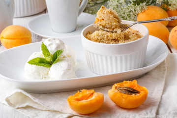 crumble with apricot and cinnamon served on table