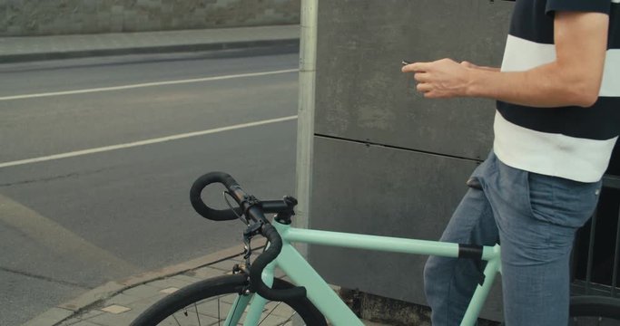 Cyclist man and fixed gear sport bike