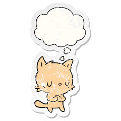 cartoon cat and thought bubble as a distressed worn sticker