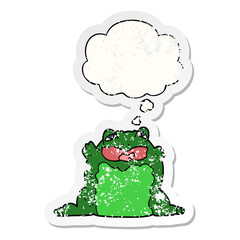 cartoon toad and thought bubble as a distressed worn sticker