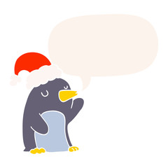 cute cartoon christmas penguin and speech bubble in retro style