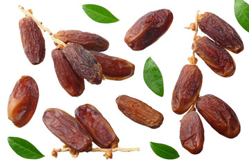 branch with date fruits with green leaves isolated on white background. top view
