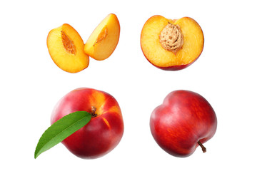 Nectarine with green leaf and slices isolated on white background. top view