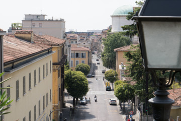 Obraz na płótnie Canvas Brescia City View through Street