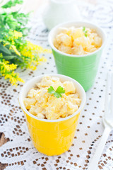 Pineapple and chicken salad in glasses, selective focus