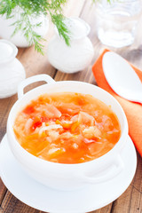 vegetable soup with onions and cabbage for onion diet in a white bowl, selective focus