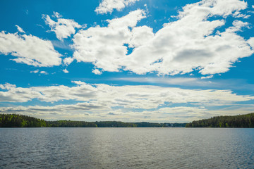 Obraz premium Lake, clouds and sky landscape. Forest. Imatra. Finland