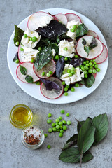 Healthy salad with radish, green peas and white cheese. Dietary food. Keto diet. Keto lunch Keto Salad