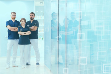 group of doctors posing in hospital / concept modern medical clinic, doctor's work, medical uniform, medical team