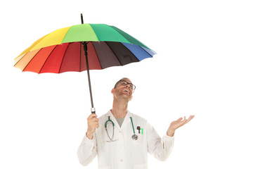 Handsome doctor with a opened colorful umbrella