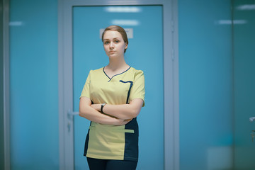 female pediatrician / doctor at work in clinic, concept of female child doctor in modern medical clinic
