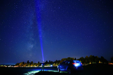 night scenery of a star and a machine, an adventure in the night scenery, the milky way above travelers
