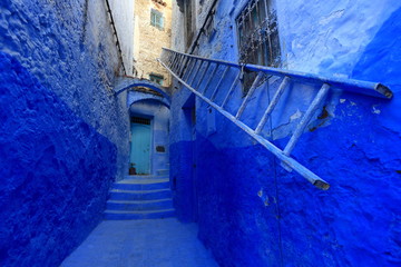 Blue street walls of the popular city of Morocco, Chefchaouen. Traditional moroccan architectural details - 275642201