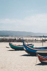Fototapeta na wymiar Old boats on the beach Nazare