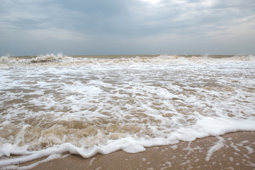 Sea during a storm. Waves against the sky. There is a place for text. Copy space. Summer concept