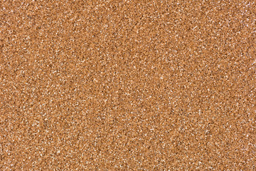Light brown glitter texture. Shiny holiday background for your desktop.