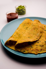Chilla or Besan cheela is a simple pancake made with chickpea flour and some basic ingredients served with green chutney and tomato sauce, also known as veg-omelette