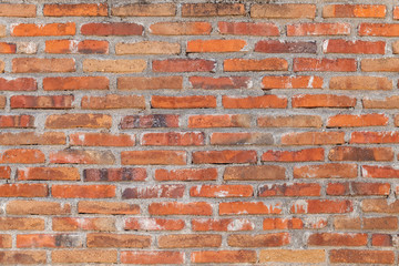 Light orange brick wall with copy space.
