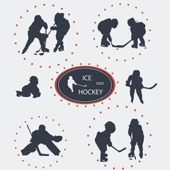 Vector silhouettes of ice hockey players - kids on a white background