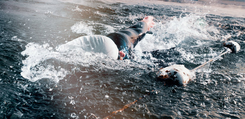 Triathlon Athlete in Swimming Motion