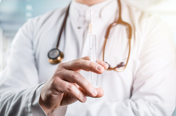 Doctor with syringe with hyaluronic acid, aesthetic medicine