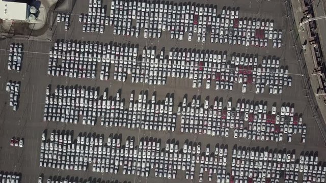 Aerial Ascend: Parking Lot Full Of White Cars, Wollongong, Australia
