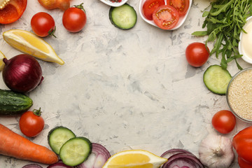 Ingredients for cooking salad. frame from Various vegetables and spices carrot, tomato, onion, cucumber, pepper and arugula on a light background. top view.