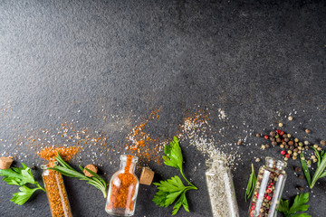 Cooking food background with herbs, olive oil and spices