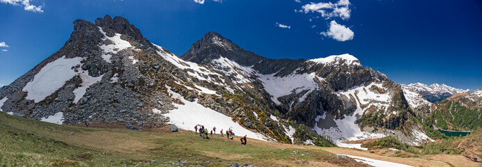 Fototapeta na wymiar Hikers near the Forca di Larecchio in Piedmont, Italy.