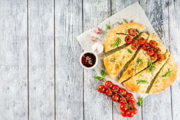Focaccia with tomatoes and basil