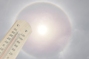 Thermometer shows the temperature is heat in the sky