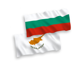 Obraz premium National vector fabric wave flags of Bulgaria and Cyprus isolated on white background. 1 to 2 proportion.