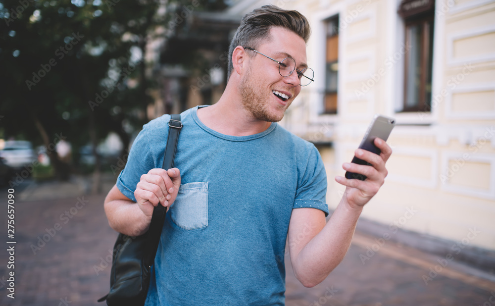 Poster caucasian male blogger excited with received message from follower in social network with good conte