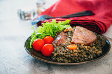 Green lentils with smoked pork sausage smoked choice, carrots and onions