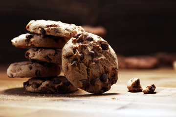 Chocolate cookies on wooden table. Chocolate chip cookies